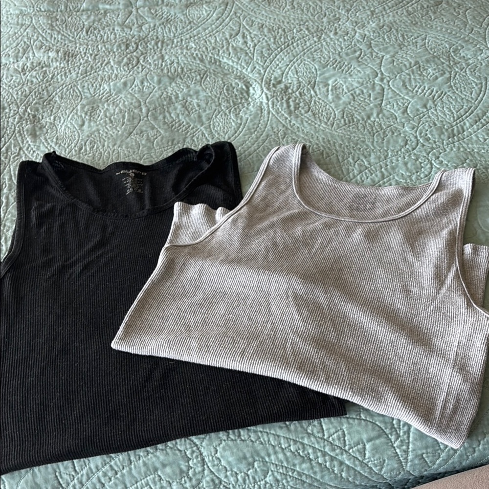 2 Sleeveless Tank Tops. One Black, One Gray